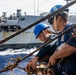 Sailors Aboard USS Dewey (DDG 105) Conduct Replenishment-at-Sea with USNS Tippecanoe (T-AO-199)