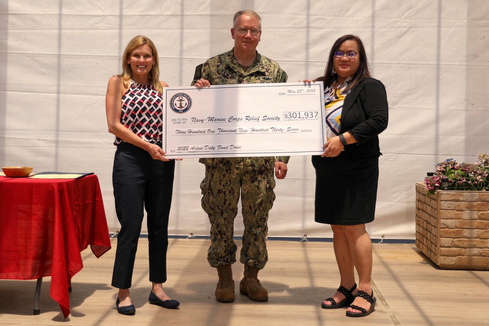 CSG-7 Presents a Check to NMCRS During an Award Ceremony