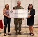 CSG-7 Presents a Check to NMCRS During an Award Ceremony