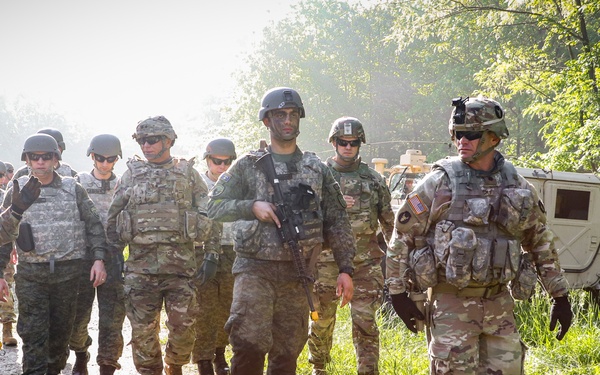 Iowa, Kosovo leaders visit troops at Camp Atterbury