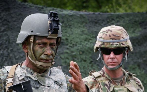 Kosovo Security Force troop briefs Iowa, Kosovo leaders on maneuver tactics