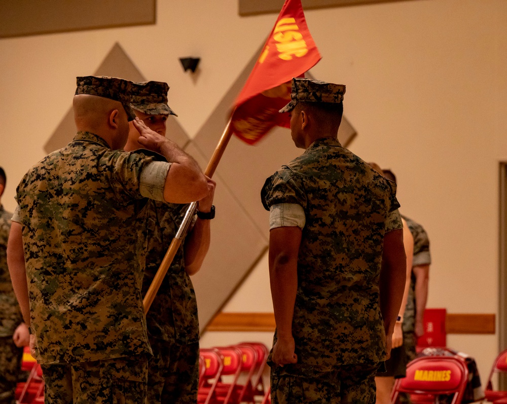 U.S. Marine Corps Capt. Jason Sander Presents Bravo Company Guidon to The New Company Commander