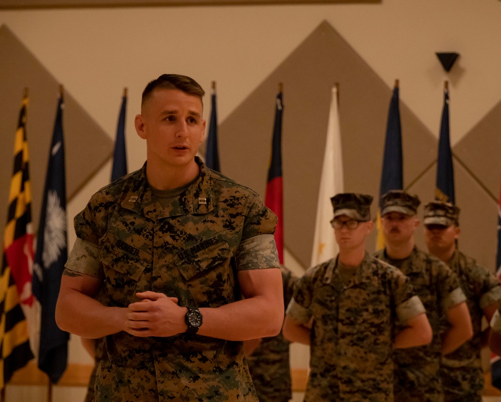 U.S. Marine Corps Capt. Jason Sander Presents Bravo Company Guidon to The New Company Commander