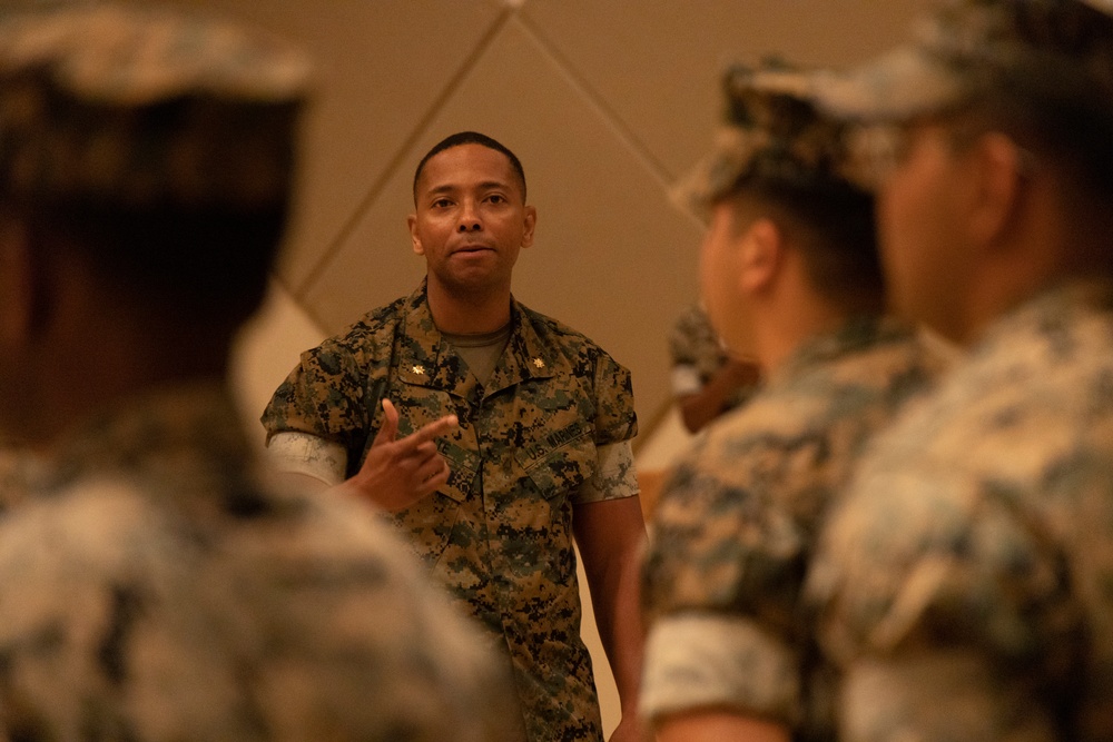 U.S. Marine Corps Capt. Jason Sander Presents Bravo Company Guidon to The New Company Commander