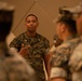 U.S. Marine Corps Capt. Jason Sander Presents Bravo Company Guidon to The New Company Commander