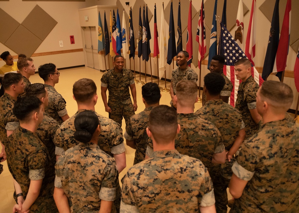 U.S. Marine Corps Capt. Jason Sander Presents Bravo Company Guidon to The New Company Commander