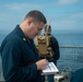 Naval Officer Evaluates Live Fire Exercise