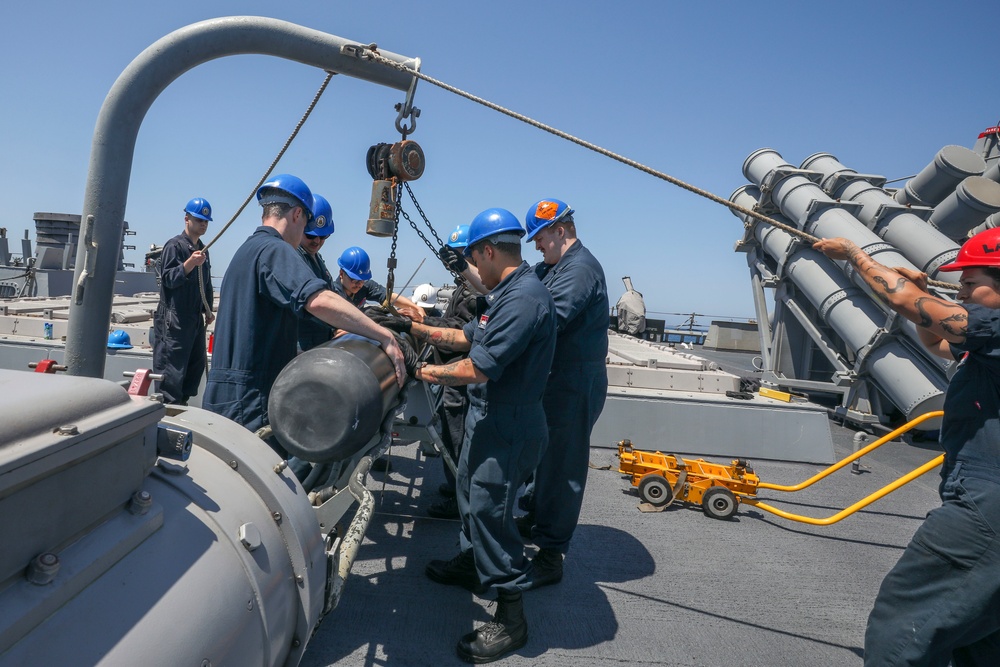 Sailors Load Torpedo