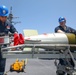 Sailors Load Torpedo