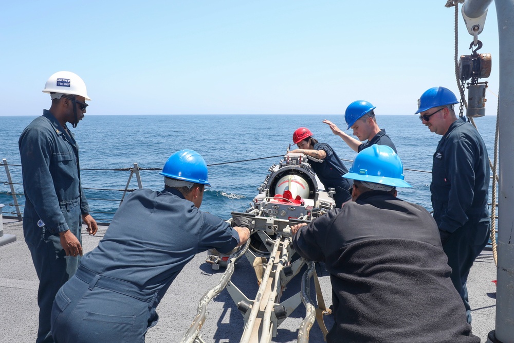 Sailors Load Torpedo