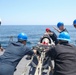 Sailors Load Torpedo