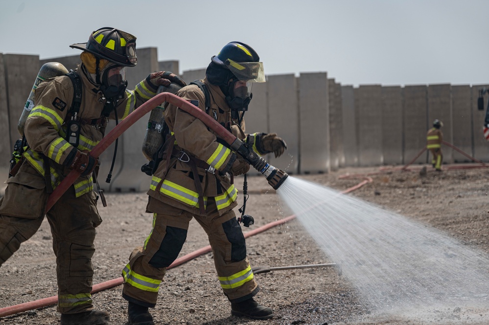 U.S Air Force firefighters and Army medics hone readiness skills at Chabelley Airfield, Djibouti