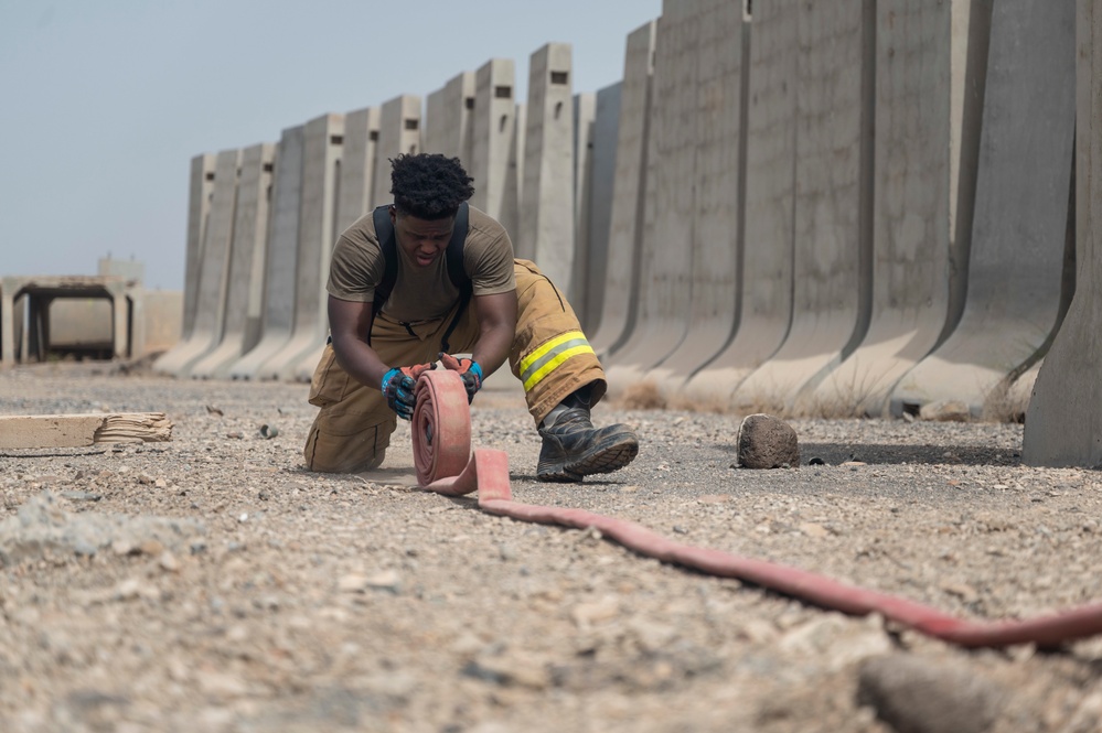 U.S Air Force firefighters and Army medics hone readiness skills at Chabelley Airfield, Djibouti