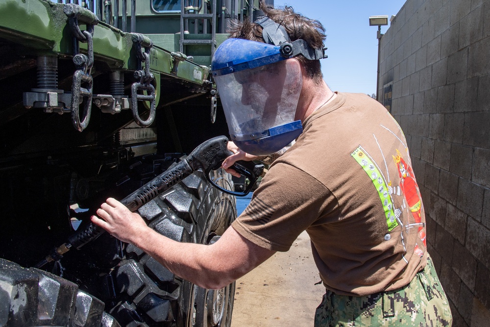 NMCB-5 Demonstrates Skills to Mount Out 15 Pieces of Construction Equipment and 42 Triple Containers