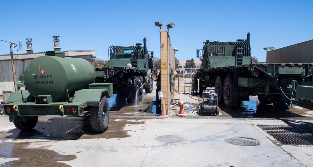 NMCB-5 Demonstrates Skills to Mount Out 15 Pieces of Construction Equipment and 42 Triple Containers