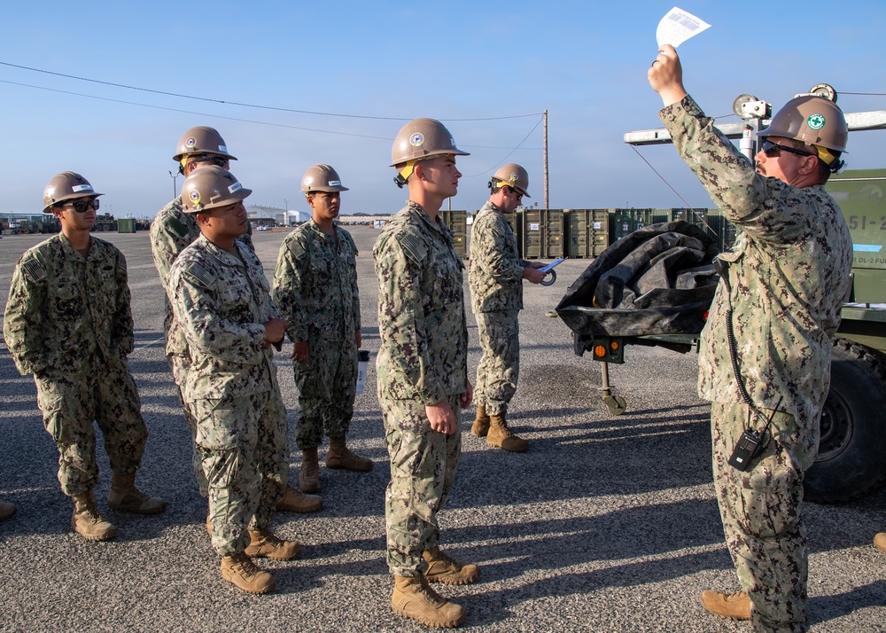 NMCB-5 Demonstrates Skills to Mount Out 15 Pieces of Construction Equipment and 42 Triple Containers