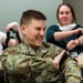 Students partake in medical simulations, tour base facilities