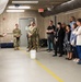 Students partake in medical simulations, tour base facilities