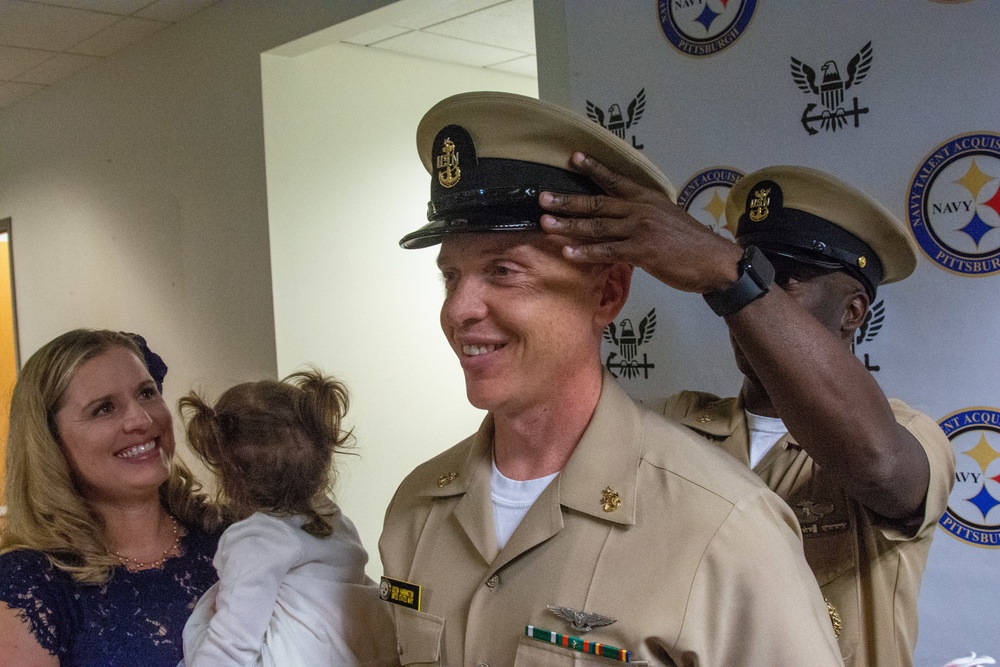 Senior Chief Navy Counselor Justin Harrington pinned