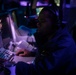 Sailors Stand Watch in Combat Information Center Aboard USS Ralph Johnson (DDG 114)