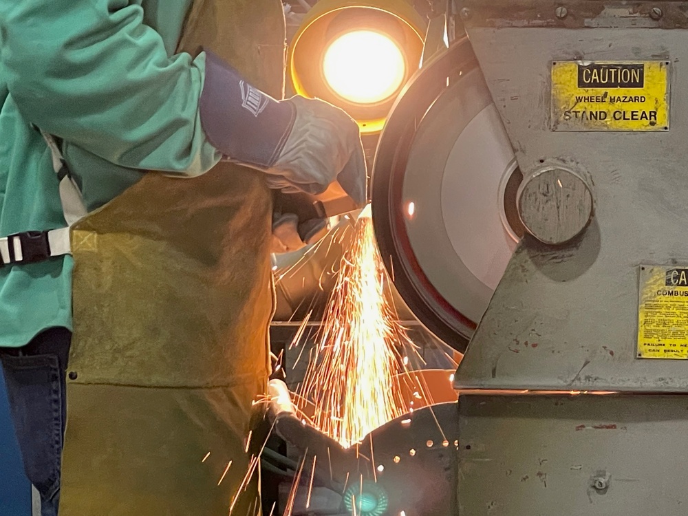 Grinding a steel casting