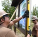 NMCB-14 installs an informative sign highlighting local wildlife at Boca Chica Field, Naval Air Station Key West.