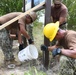 NMCB-14 installs an informative sign highlighting local wildlife at Boca Chica Field, Naval Air Station Key West.