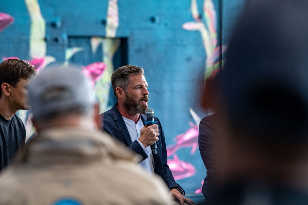 Panelists speak at an Environmental Sustainibility Forum