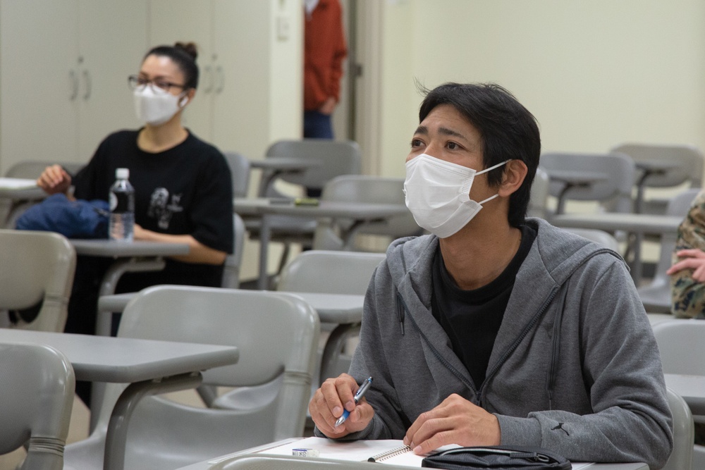 COMMUNITY RELATIONS LONG-STANDING EFFORT: ENGLISH CLASS FOR ADULT STUDENTS