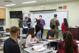 COMMUNITY RELATIONS LONG-STANDING EFFORT: ENGLISH CLASS FOR ADULT STUDENTS