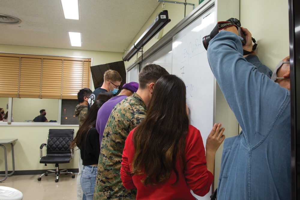 COMMUNITY RELATIONS LONG-STANDING EFFORT: ENGLISH CLASS FOR ADULT STUDENTS