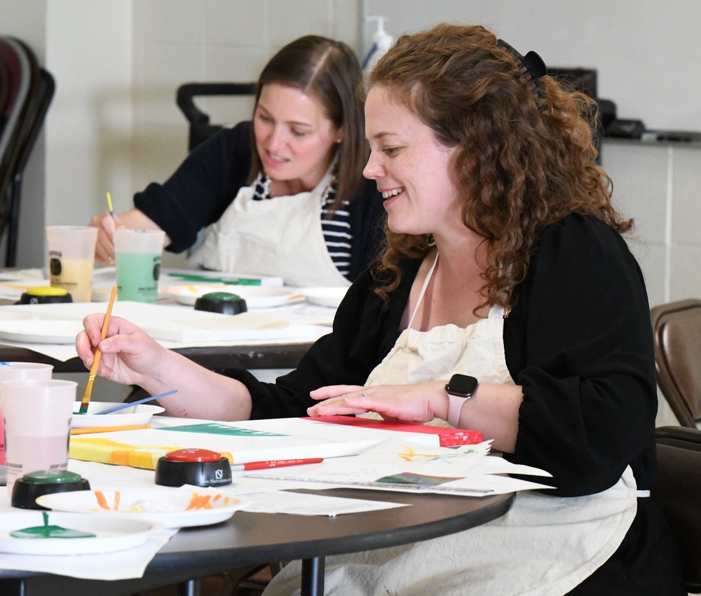 Fort Drum Family Advocacy Program staff helps community members to paint stress away
