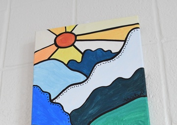 Fort Drum Family Advocacy Program staff helps community members to paint stress away