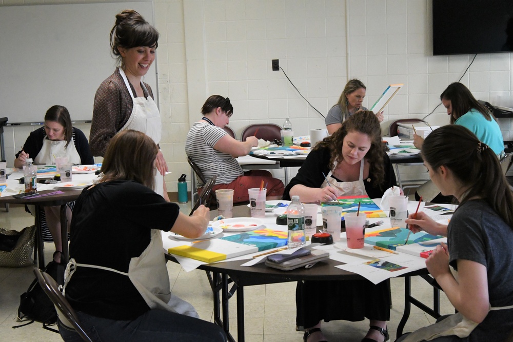 Fort Drum Family Advocacy Program staff helps community members to paint stress away