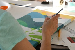 Fort Drum Family Advocacy Program staff helps community members to paint stress away