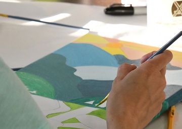 Fort Drum Family Advocacy Program staff helps community members to paint stress away