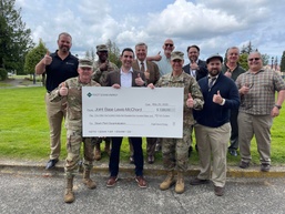 JBLM presented with $1.6 million energy saving rebate check