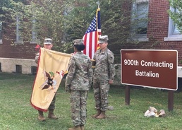 Soldiers from the 900th CBN uncase their colors