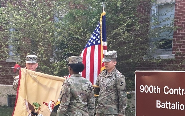 Soldiers from 900th CBN uncase their colors