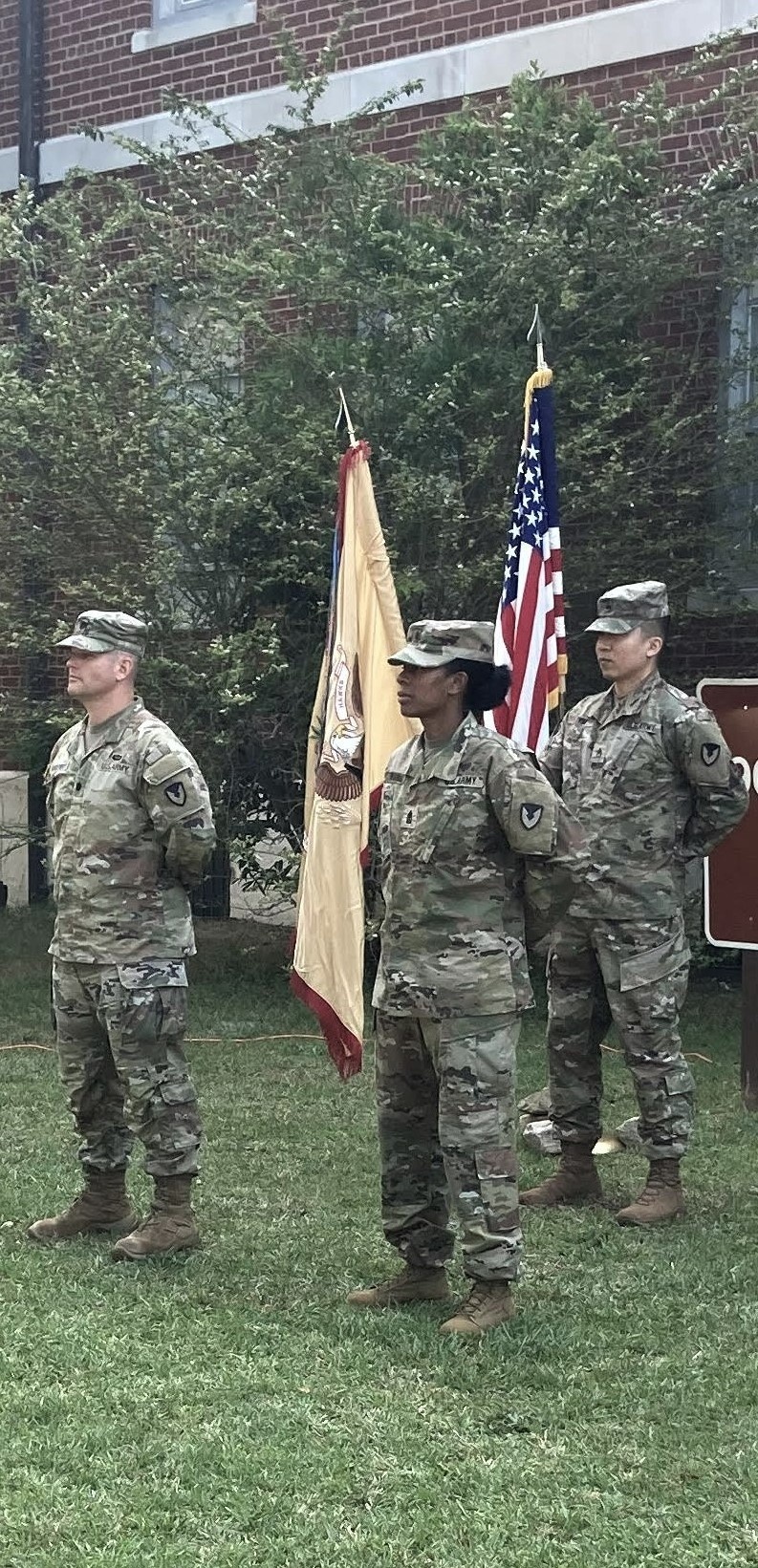 Soldiers from the 900th CBN uncase their colors