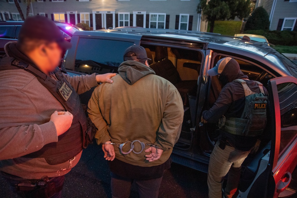 ICE Enforcement and Removal Operations (ERO) deportation officers effect an arrest