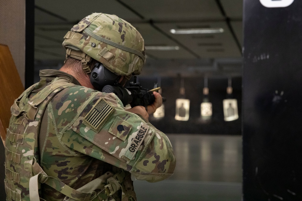 Competitors conduct the stress shoot event as the SETAF-AF Best Warrior and Squad Competition continues