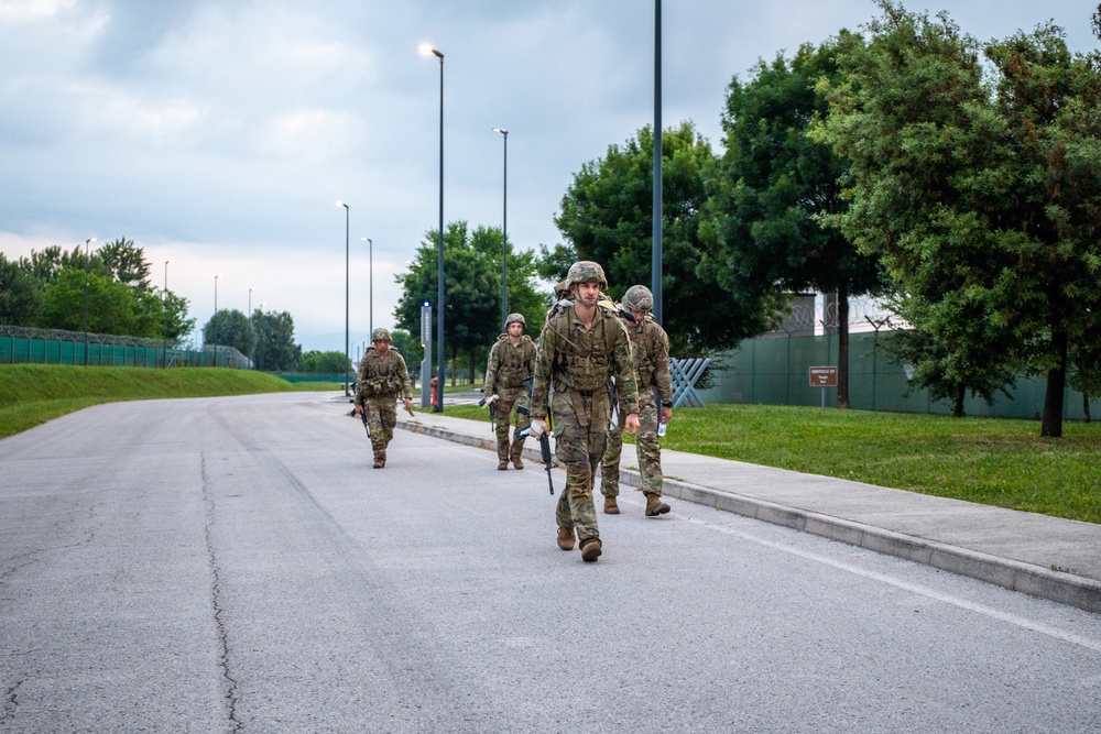 Soldiers conduct foot march