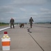 Last Steps: Airmen Check Runway for Debris prior to Reopening