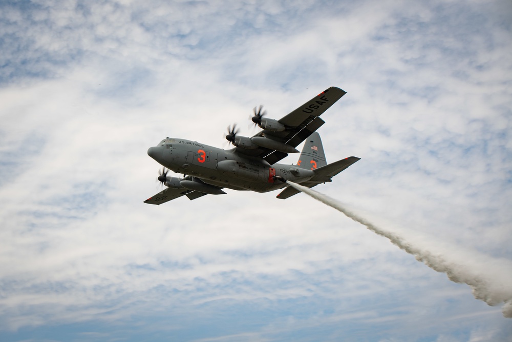 A C-130 from the 153d Airlift Wing equipped with USDA Forest Service MAFFS II (Modular Airborne Fire Fighting System)