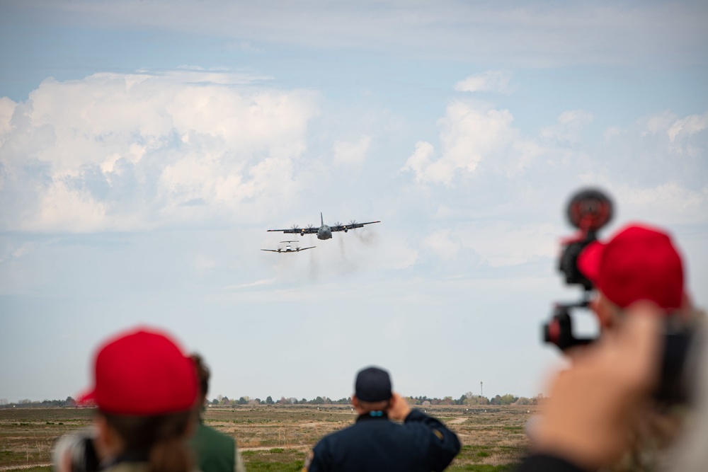 A C-130 from the 153d Airlift Wing equipped with USDA Forest Service MAFFS II (Modular Airborne Fire Fighting System)