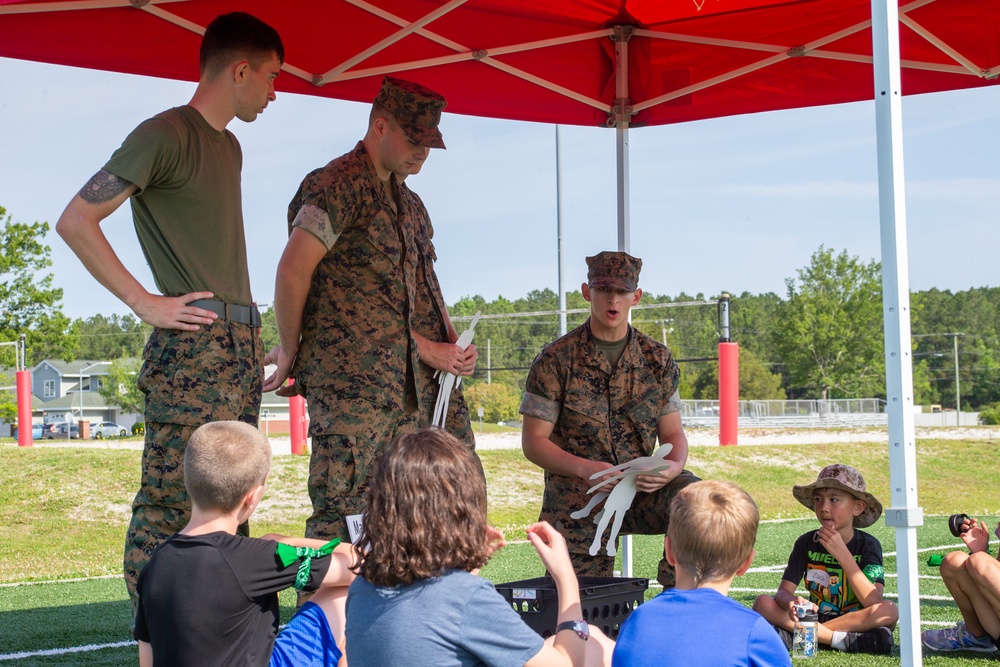 Devil Pups: Children Put on Boots of Marine Parents