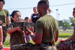 Devil Pups: Children Put on Boots of Marine Parents
