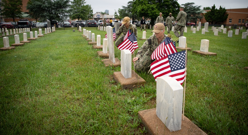 NMCP SAILORS PLACE MEMORIAL DAY FLAGS AT NSA HR-PA CEMETERY