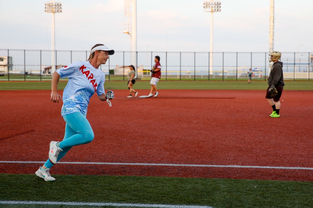 Abraham Lincoln Sailors participate in a MWR softball game